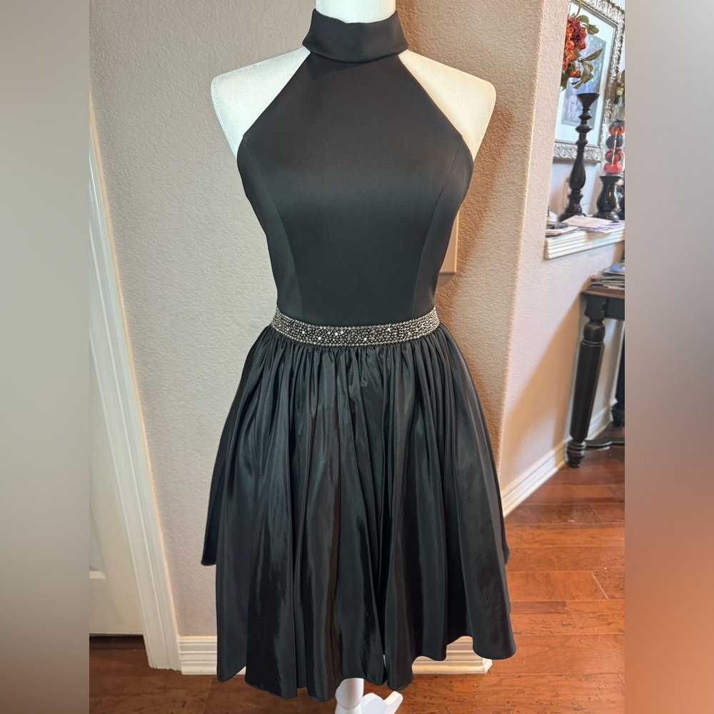 Sherri Hill size 4 black halter dress with beaded waistline.
